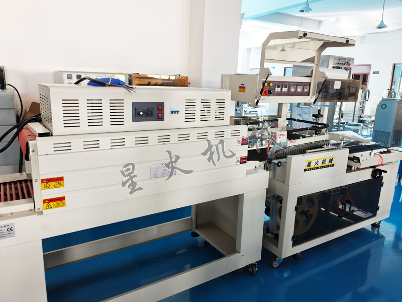 江蘇食品包裝機升級熱收縮包裝技術(shù)，給出休閑零食包裝新體驗